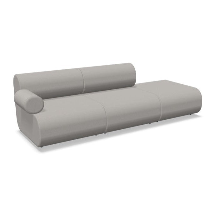 Grijze design bank met ronde vormen, modern kantoormeubilair voor werkplekken en lounges.